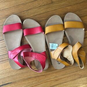 Yellow and red pair of sandals with velcro closure